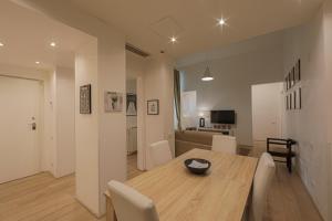 A television and/or entertainment centre at Luxury apt in the heart of city out of ZTL