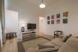 A television and/or entertainment centre at Luxury apt in the heart of city out of ZTL