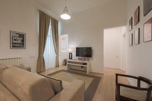 A television and/or entertainment centre at Luxury apt in the heart of city out of ZTL