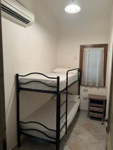 Postel nebo postele na pokoji v ubytování Villetta a schiera frontemare