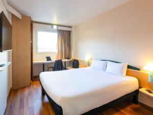 Postel nebo postele na pokoji v ubytování Ibis Bilbao Barakaldo + 37 fotografií