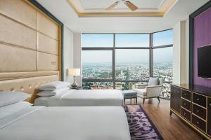 Postel nebo postele na pokoji v ubytování Sheraton Can Tho