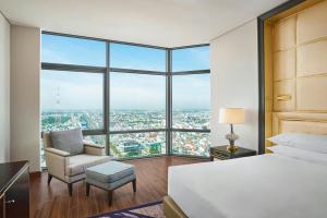 Postel nebo postele na pokoji v ubytování Sheraton Can Tho