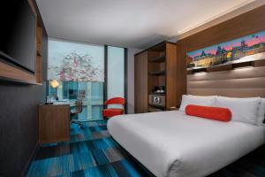 Ein Bett oder Betten in einem Zimmer der Unterkunft Aloft Dublin City