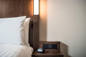 Postel nebo postele na pokoji v ubytování Courtyard by Marriott Baku