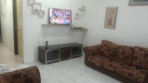 Μια τηλεόραση ή/και κέντρο ψυχαγωγίας στο Homestay Ku IM