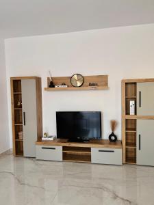 TV a/nebo společenská místnost v ubytování David Home + 9 fotografií
