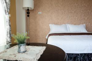 Postel nebo postele na pokoji v ubytování Sea Princess B&B