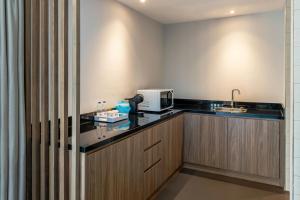 Cuisine ou kitchenette dans l'établissement Aloft Palm Jumeirah