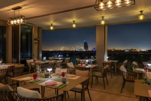 Restaurant ou autre lieu de restauration dans l'établissement Aloft Palm Jumeirah