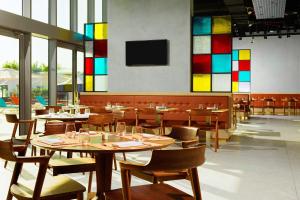 Restaurant ou autre lieu de restauration dans l'établissement Aloft Palm Jumeirah