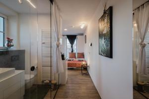Ένα ή περισσότερα κρεβάτια σε δωμάτιο στο 24-7 Living Room Passau - Cozy - Balcony - Kitchen