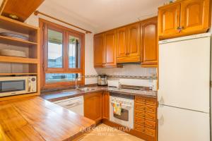 Η κουζίνα ή μικρή κουζίνα στο Guardamar sea view apartment El Moncayo beach