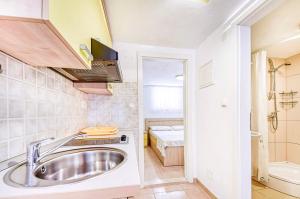 Kúpeľňa v ubytovaní Apartment Ennio + 37 fotografií