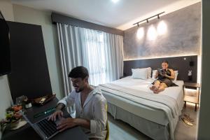 Ένα ή περισσότερα κρεβάτια σε δωμάτιο στο Hotel Rotorua inn Fortaleza - Beira Mar