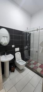 Vannituba majutusasutuses Hotel Kleo