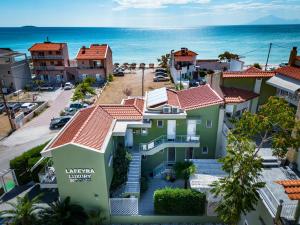 an aerial view of a town next to the ocean at Lafeyra Hotel in Limenaria
