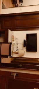 TV a/nebo společenská místnost v ubytování GOODWILL HOTEL