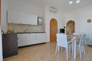 Gambar di galeri bagi Casa Monsellato 1B SX a soli 120 mt dalla spiaggia Padula Fede di Punta Prosciutto di Punta Prosciutto