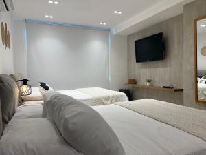 Apartment with direct access to the Sea in CTG客房内的一张或多张床位