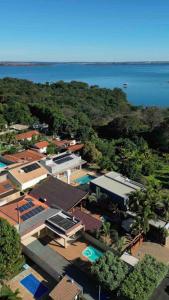 an aerial view of a resort with the ocean at Rancho condominio Lago e Sol - com piscina aquecida e ar condicionado in Fronteira