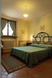 Ένα ή περισσότερα κρεβάτια σε δωμάτιο στο Agriturismo Casal Gheriglio +83 φωτογραφίες