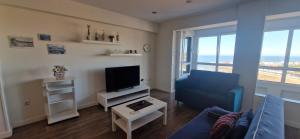 Μια τηλεόραση ή/και κέντρο ψυχαγωγίας στο Espectacular piso 1ª Linea de Playa