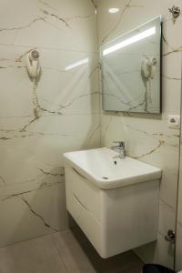 Koupelna v ubytování Hotel Univers Laç