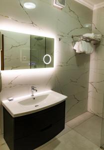 Koupelna v ubytování Hotel Univers Laç