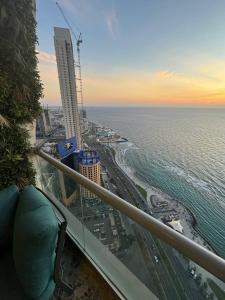 a view of the ocean from the balcony of a building at برج داماك الكورنيش جدة - Damac Tower Corniche Jeddah in Jeddah