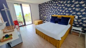 Postel nebo postele na pokoji v ubytování Villa Verna Agriresort + 47 fotografií