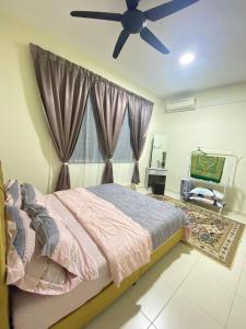 Katil atau katil-katil dalam bilik di Arissa Homestay