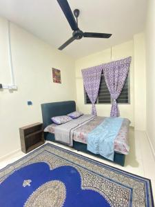 Katil atau katil-katil dalam bilik di Arissa Homestay +2 gambar