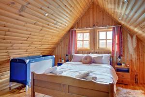 Postel nebo postele na pokoji v ubytování Double Paradise