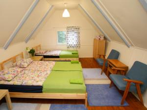 Postel nebo postele na pokoji v ubytování Harangvirág 36 Faház