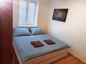 Apartmány Kristýna 객실 침대