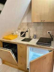 Kuchyň nebo kuchyňský kout v ubytování La Rosa Bianca + 5 fotografií