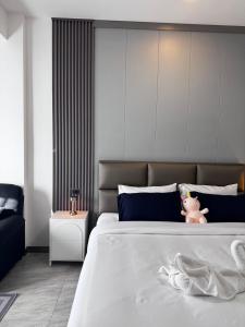 Postel nebo postele na pokoji v ubytování Maesai Bliss Residence