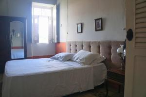 Llit o llits en una habitació de Cenário Hostel e Boteco