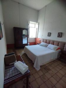 Llit o llits en una habitació de Cenário Hostel e Boteco