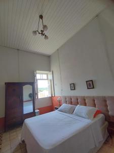 Llit o llits en una habitació de Cenário Hostel e Boteco