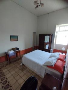 Llit o llits en una habitació de Cenário Hostel e Boteco
