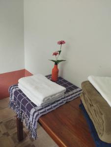 Llit o llits en una habitació de Cenário Hostel e Boteco