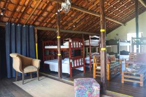 Llit o llits en una habitació de Cenário Hostel e Boteco