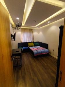 Postel nebo postele na pokoji v ubytování C O Apartment
