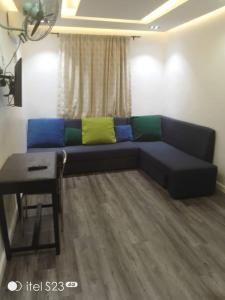 Posezení v ubytování C O Apartment