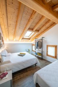 Rúm í herbergi á Borgo Paolin - Camere in vigna