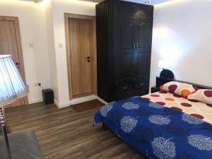 Postel nebo postele na pokoji v ubytování C O Apartment