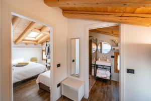 Rúm í herbergi á Borgo Paolin - Camere in vigna