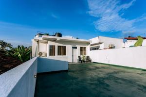a view from the roof of a house with a swimming pool at Madiha Ceylon Hotel in Matara